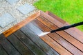 Cleaning terrace with a power washer