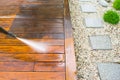 Cleaning terrace with a power washer