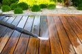 Cleaning terrace with a power washer Royalty Free Stock Photo