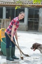 Cleaning time for kennel assistant Royalty Free Stock Photo