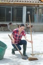 Cleaning time for kennel assistant Royalty Free Stock Photo