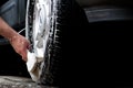 Cleaning tire in a car wash