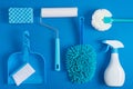 Cleaning tools blue background Royalty Free Stock Photo