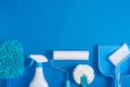 Cleaning tools blue background Royalty Free Stock Photo