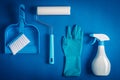 Cleaning tools blue background Royalty Free Stock Photo