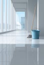 Cleaning tools with blue bucket and broom in bright modern hallway with large windows Royalty Free Stock Photo