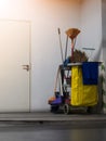 Cleaning tools cart wait for cleaning.Bucket and set of cleaning equipment in the office Royalty Free Stock Photo