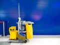 Cleaning tools cart wait for cleaning.Bucket and set of cleaning equipment in the office Royalty Free Stock Photo