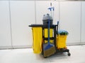 Cleaning tools cart wait for cleaning.Bucket and set of cleaning equipment in the office. janitor service janitorial for your Royalty Free Stock Photo