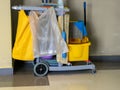 Cleaning tools cart wait for cleaner.Bucket and set of cleaning equipment in the office. janitor service janitorial for your place Royalty Free Stock Photo