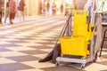 Cleaning tools cart wait for cleaning.Bucket and set of cleaning equipment in the Department store Royalty Free Stock Photo