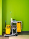 Cleaning tools cart wait for cleaning.Bucket and set of cleaning equipment in the office. janitor service janitorial for your plac Royalty Free Stock Photo