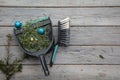 Cleaning up after christmas. Sweeping up pine needles and broken decorations Royalty Free Stock Photo