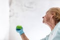 Cleaning up dangerous fungus from a wet wall after water leak Royalty Free Stock Photo