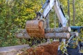 Cleaning up street after hurricane: fallen, uprooted trees to be cleaned up with tractor