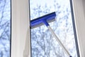 Cleaning of vinyl plastic window. squeegee tool Royalty Free Stock Photo