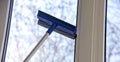 Cleaning of vinyl plastic window. squeegee tool Royalty Free Stock Photo