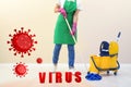 Cleaning vs viruses. Woman washing floor with mop and disinfecting solution Royalty Free Stock Photo