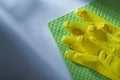 Cleaning washcloth protective gloves on white background Royalty Free Stock Photo