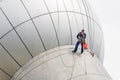 Cleaning windows service on high rise building. it is dangerous Royalty Free Stock Photo