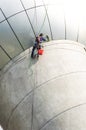 Cleaning windows service on high rise building. it is dangerous Royalty Free Stock Photo