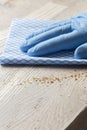 Cleaning wiping wood countertop worktop with a cloth. Housework chores concept