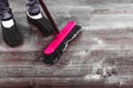 Cleaning woman sweeping wooden floor