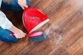 Cleaning woman sweeping wooden floor Royalty Free Stock Photo