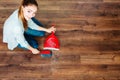 Cleaning woman sweeping wooden floor Royalty Free Stock Photo