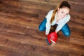 Cleaning woman sweeping wooden floor Royalty Free Stock Photo