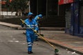 Cleaning workers in bogota street