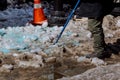 Cleaning the yard of snow Workers sweep snow from road in winter, Cleaning road from snow storm, Selective focus