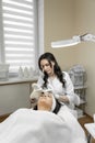 Cleansing the skin to a new level: this photo demonstrates how professional cosmetologist applies ultrasonic facial