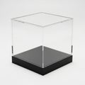 Clear Acrylic Cube Display Case with Black Base on White Background image photo Royalty Free Stock Photo