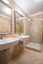 Clear and beige bathroom