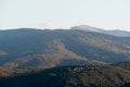 clear blue air over mountains in bulgaria crops hay fields clouds blue sharp focus distance superzoom copy space for text minimal Royalty Free Stock Photo