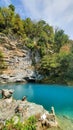 Clear blue lake against the backdrop of mountains in greenery Royalty Free Stock Photo