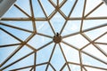 Clear blue sky bottom view through stylish glass ceiling Royalty Free Stock Photo