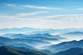 Clear blue sky frames a serene morning view of mountains