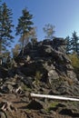 Clear blue sky over dark stones. Royalty Free Stock Photo