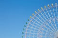 Clear blue sky over funfair ferris wheel Royalty Free Stock Photo