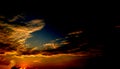 Sunset with Sky and puffy clouds. Royalty Free Stock Photo