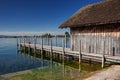 Old wooden boathouse and jetty on Lake Zug Zugersee, Switzerland