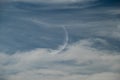 Clear Blue Sky with Whispy Faint Clouds and Faint Half Moon Royalty Free Stock Photo