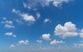 Clear blue sky with white fluffy clouds. Nature background Royalty Free Stock Photo