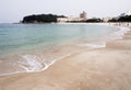 Clear blue water and white sand on Shirahama beach in Japan