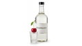 Kirschwasser Bottle and Shot Glass with Cherry Garnish Isolated on White Background Swiss Cherry Brandy Clear Distilled Royalty Free Stock Photo