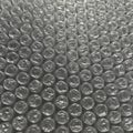 Clear bubble wrap sheet comprising rows of air-filled hemispheres Royalty Free Stock Photo