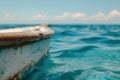 Clear close-up of seawater, fishing boat, blue sky, Royalty Free Stock Photo