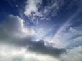 On a clear day in the clear season In the blue sky There is sunlight on the white clouds, causing black shadows to relax Royalty Free Stock Photo